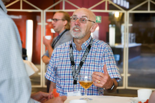 Participants in discussion during coffee break 4